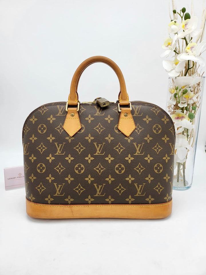 LOUIS VUITTON ALMA PM MONOGRAM