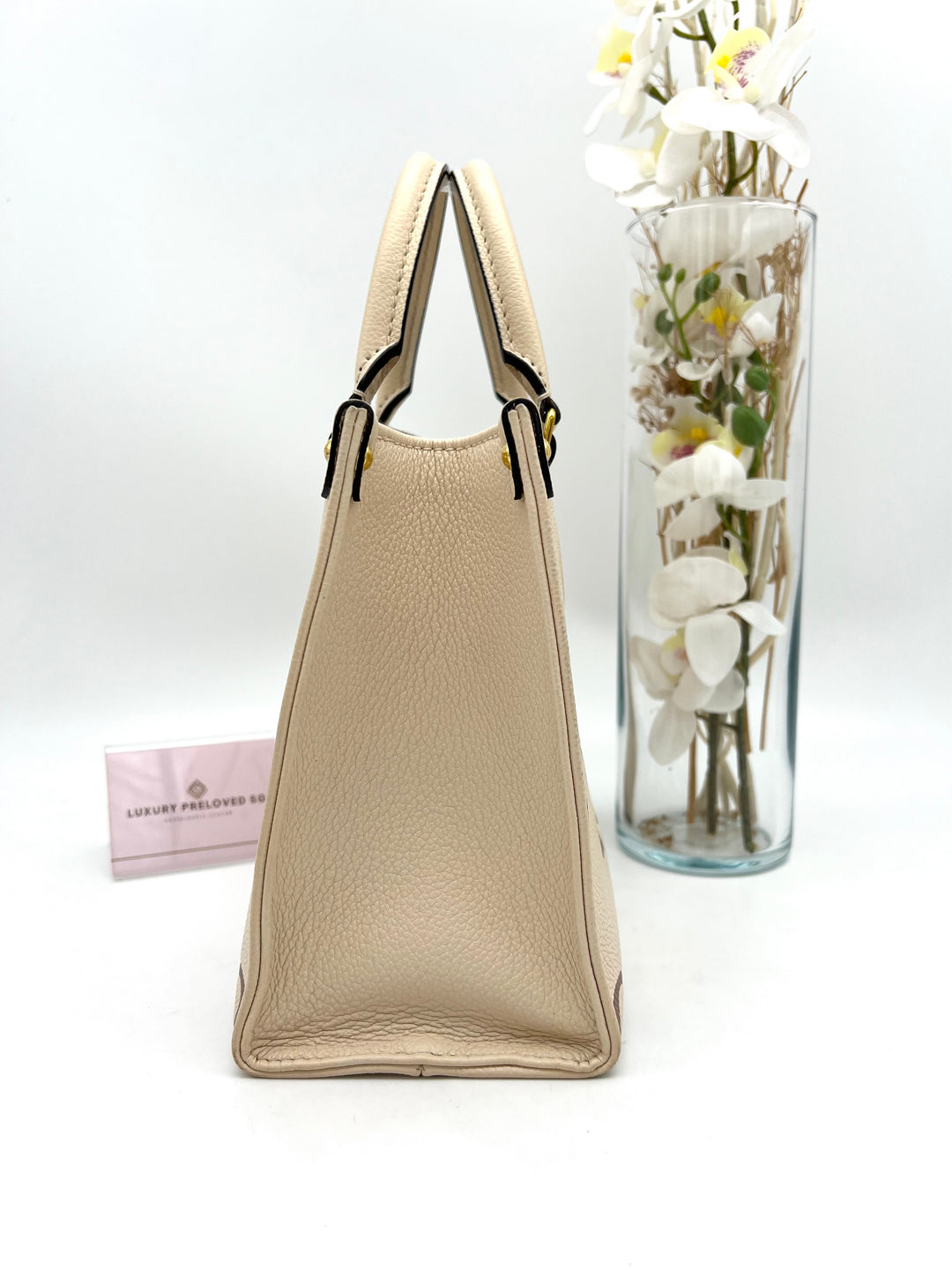 LOUIS VUITTON ON THE GO PM EMPREINTE