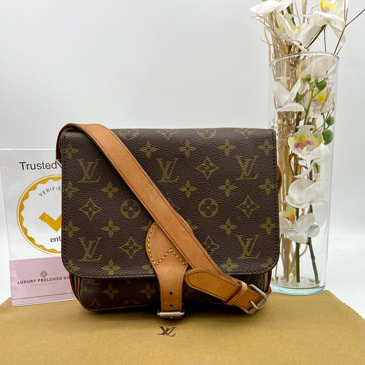 LOUIS VUITTON CARTOURCHIERA MONOGRAM PM