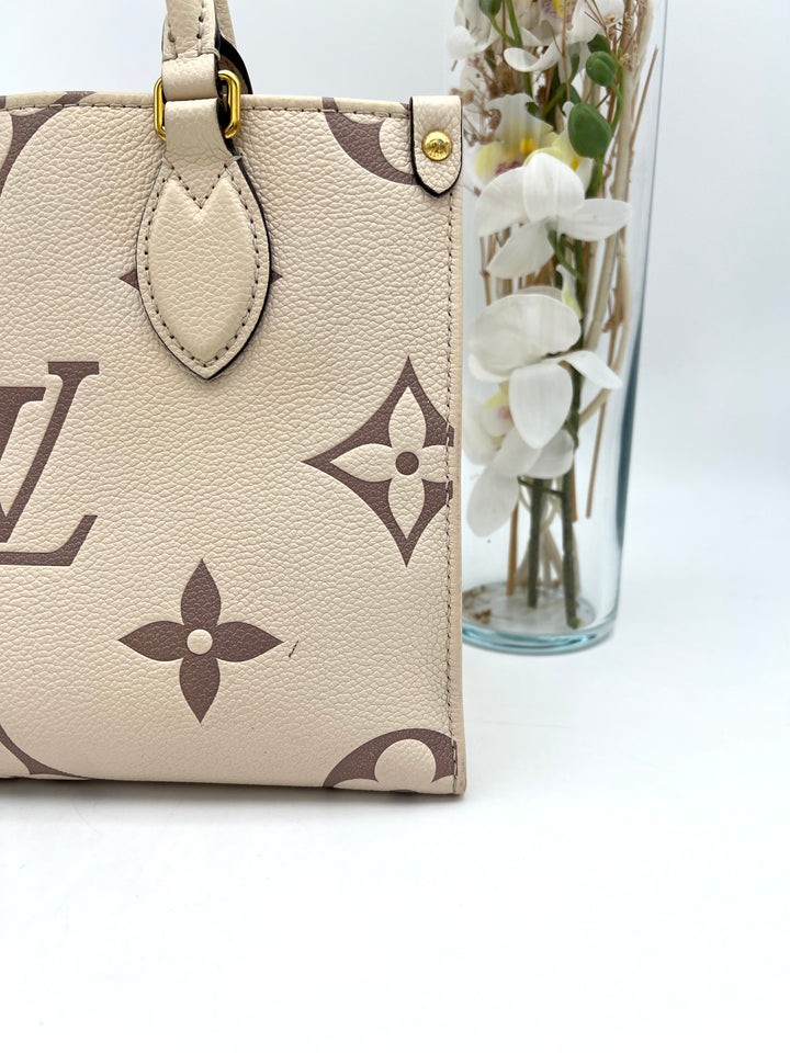 LOUIS VUITTON ON THE GO PM EMPREINTE