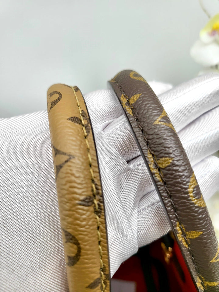 LOUIS VUITTON ON THE GO MM REVERSED