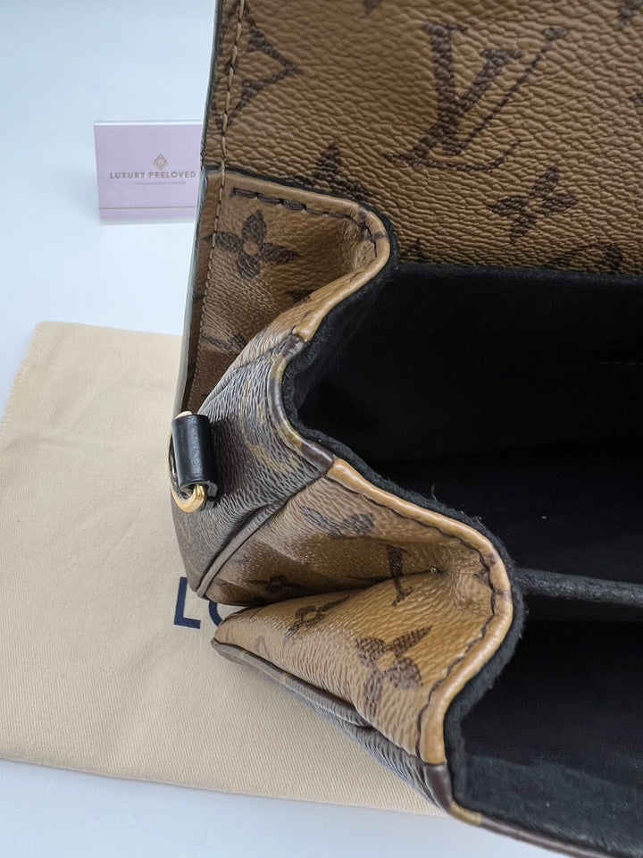 LOUIS VUITTON POCHETTE METIS MONOGRAM REVERSED