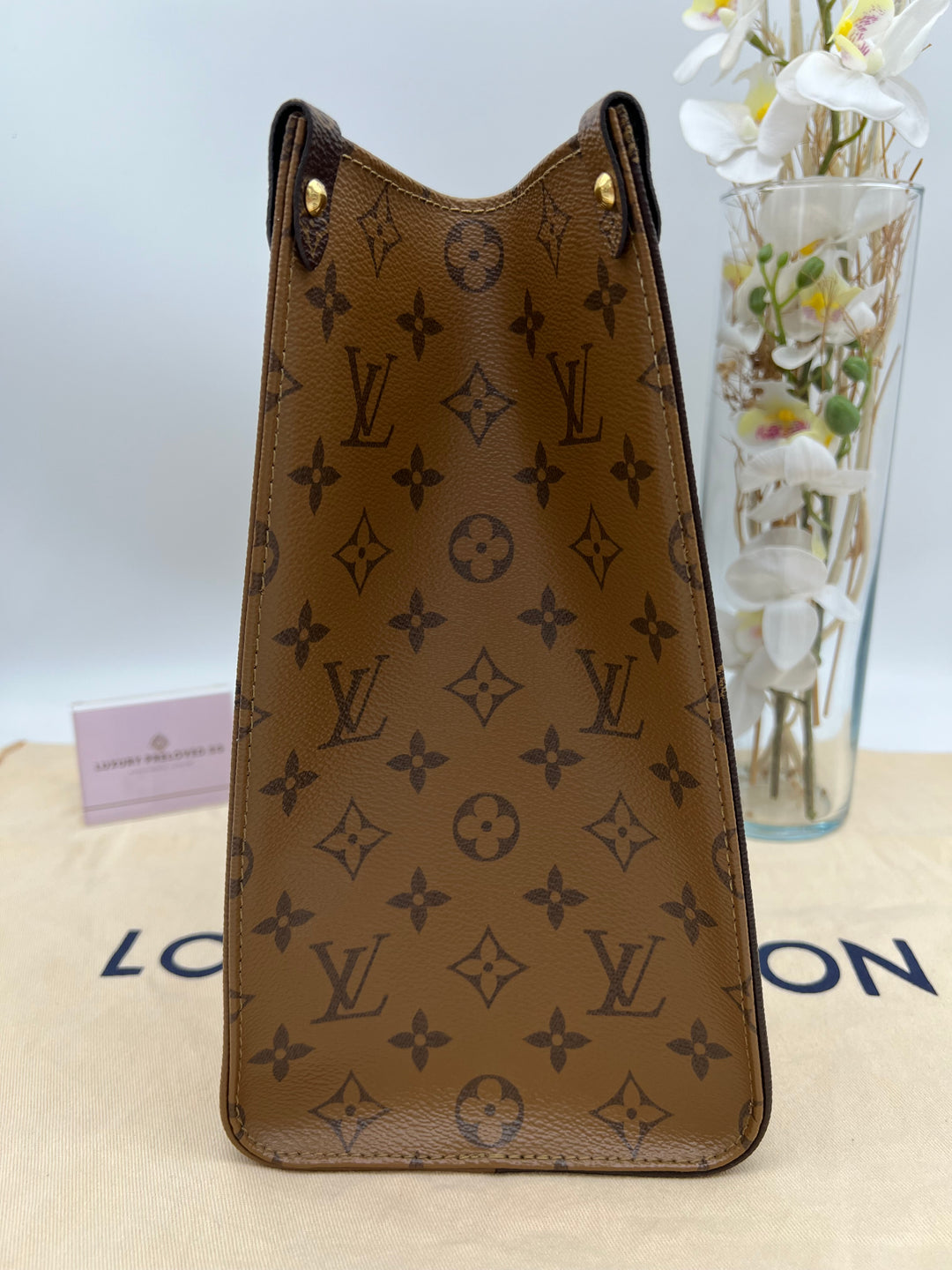 LOUIS VUITTON ON THE GO MM REVSERSED (RFID)