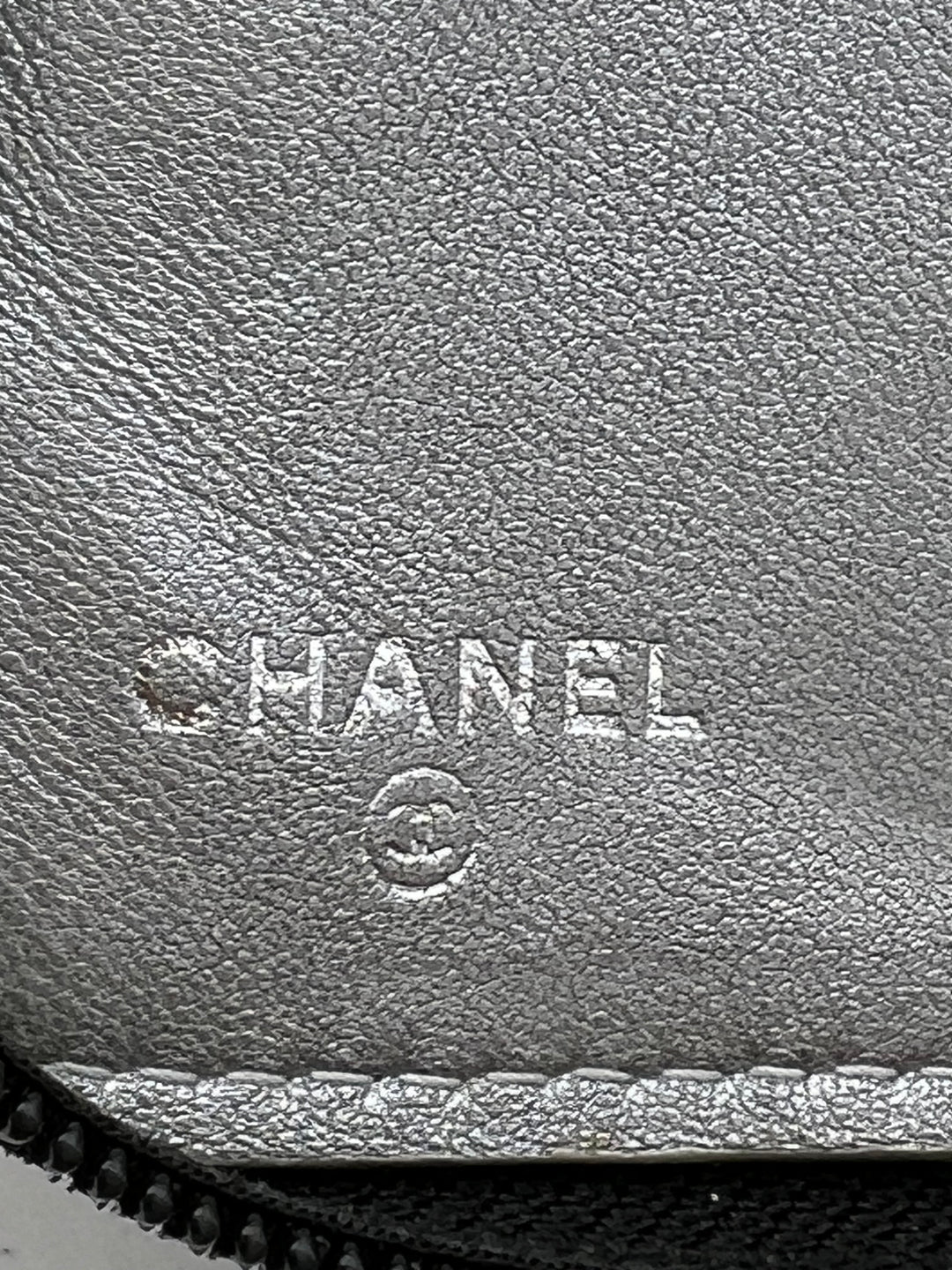 CHANEL LAMBSKIN CAMELLIA EMBOSSED ZIP AROUND ORGANISER WALLET