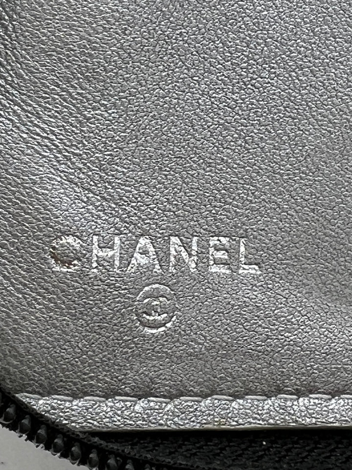 CHANEL LAMBSKIN CAMELLIA EMBOSSED ZIP AROUND ORGANISER WALLET