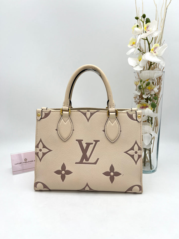 LOUIS VUITTON ON THE GO PM EMPREINTE