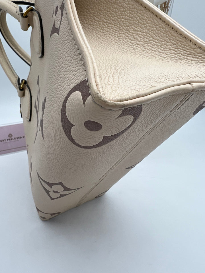 LOUIS VUITTON ON THE GO PM EMPREINTE