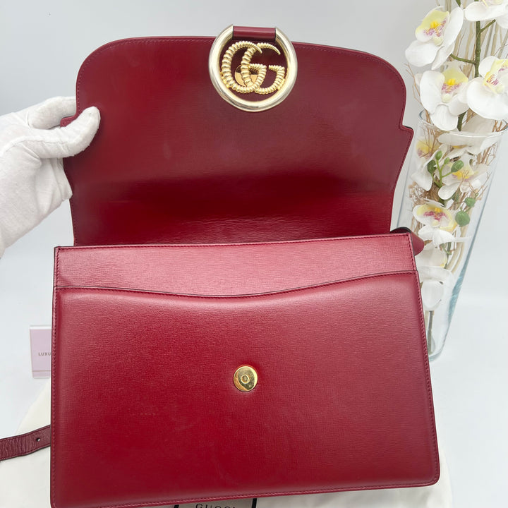 GUCCI TEXTURED CALFSKIN TORCHON GG RING CHERRY RED