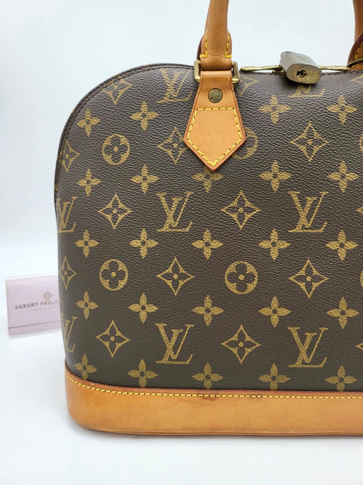LOUIS VUITTON ALMA PM MONOGRAM
