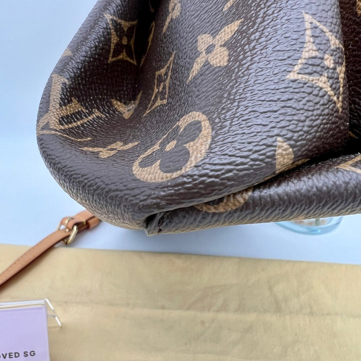 LOUIS VUITTON RIVOLI MONOGRAM PM