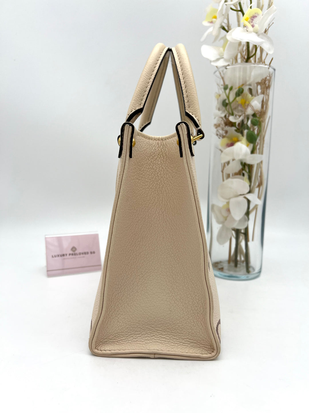 LOUIS VUITTON ON THE GO PM EMPREINTE