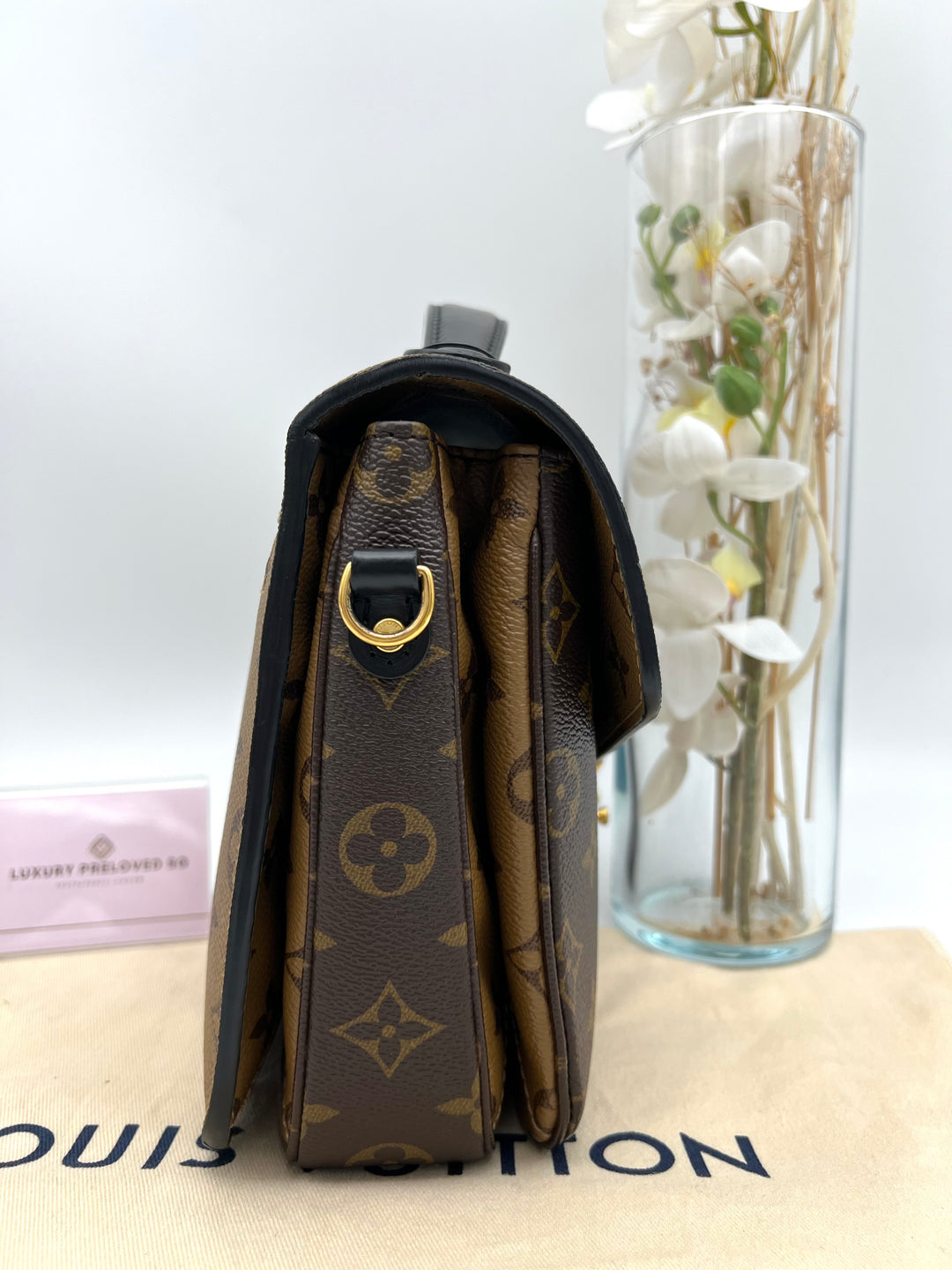 LOUIS VUITTON POCHETTE METIS MONOGRAM REVERSED