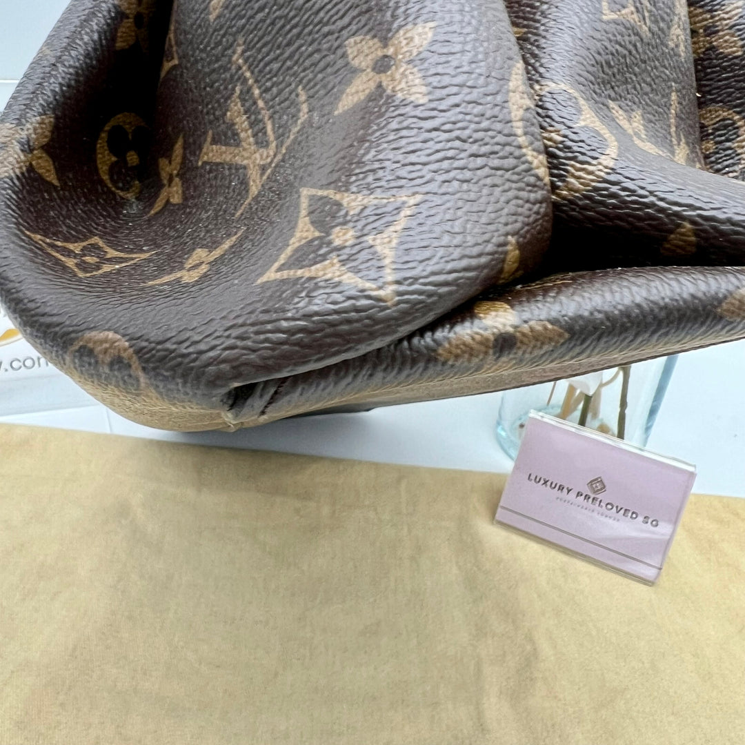 LOUIS VUITTON RIVOLI MONOGRAM PM