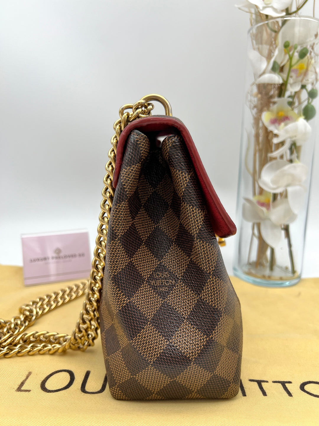 LOUIS VUITTON DAMIER EBENE CAISSA CLUTCH CHERRY