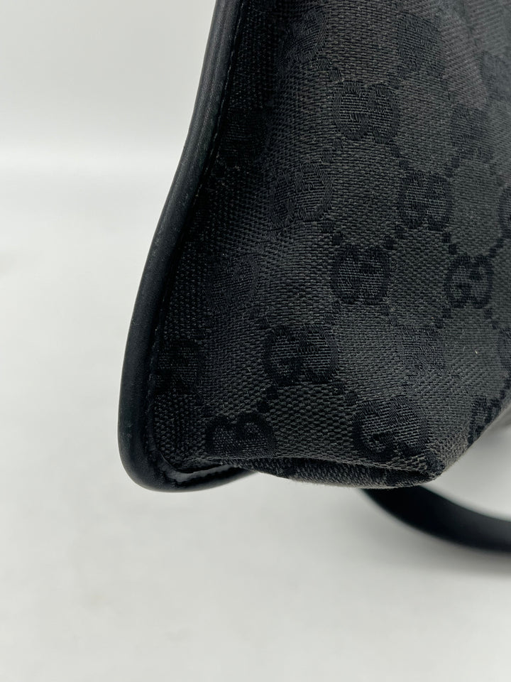 GUCCI GG CANVAS SLING BAG