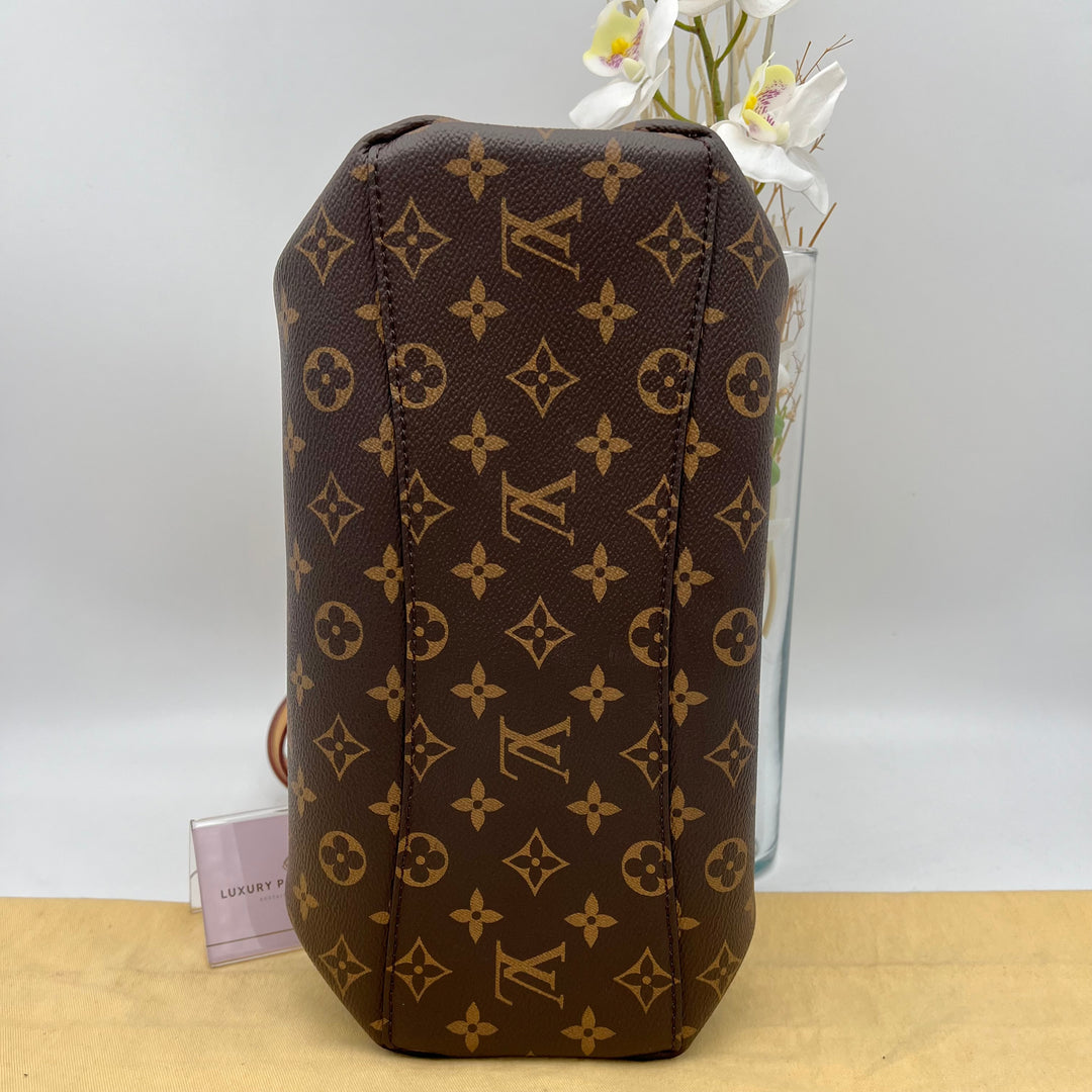 LOUIS VUITTON RIVOLI MONOGRAM PM