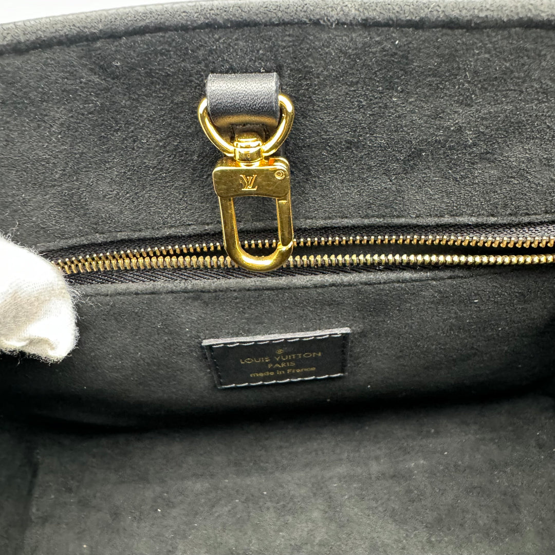 LOUIS VUITTON ON THE GO PM EMPREINTE