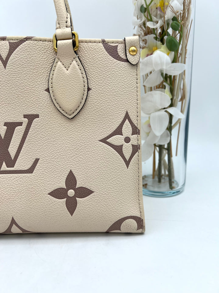 LOUIS VUITTON ON THE GO PM EMPREINTE