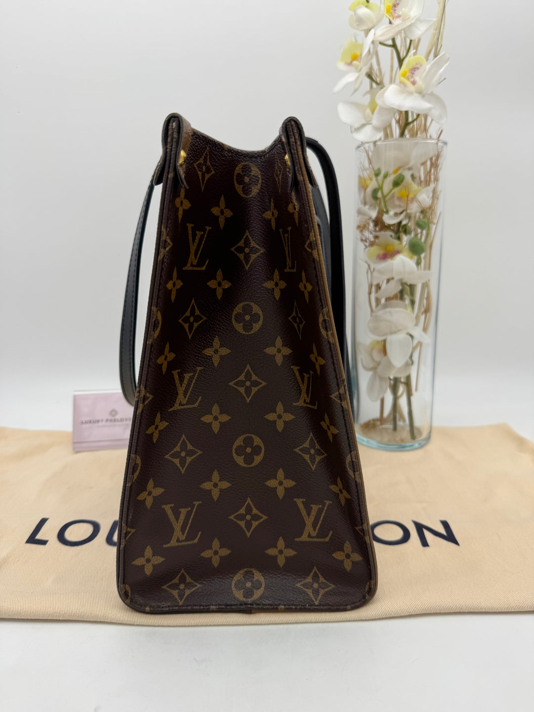 LOUIS VUITTON ON THE GO MM REVERSED