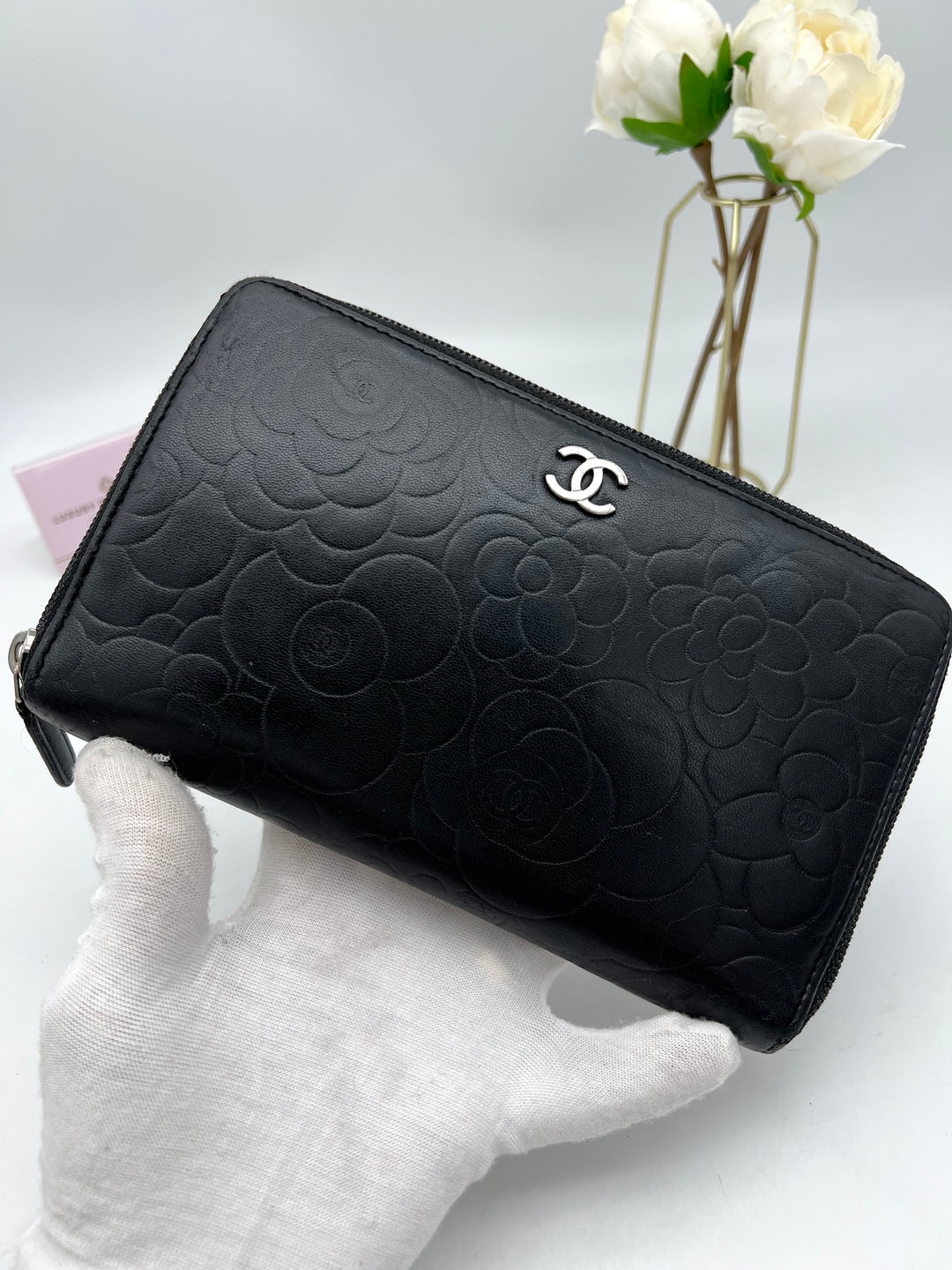 CHANEL LAMBSKIN CAMELLIA EMBOSSED ZIP AROUND ORGANISER WALLET