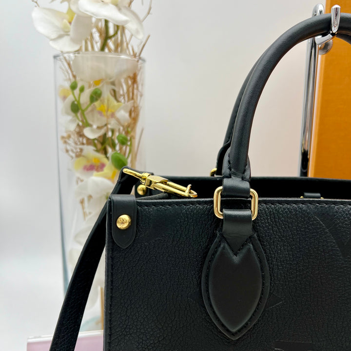 LOUIS VUITTON ON THE GO PM EMPREINTE