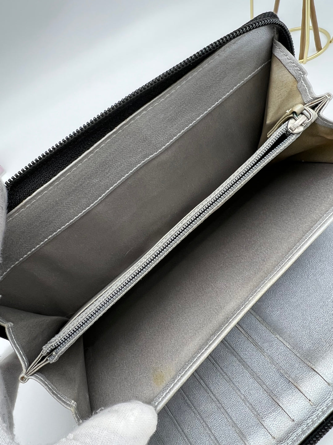 CHANEL LAMBSKIN CAMELLIA EMBOSSED ZIP AROUND ORGANISER WALLET