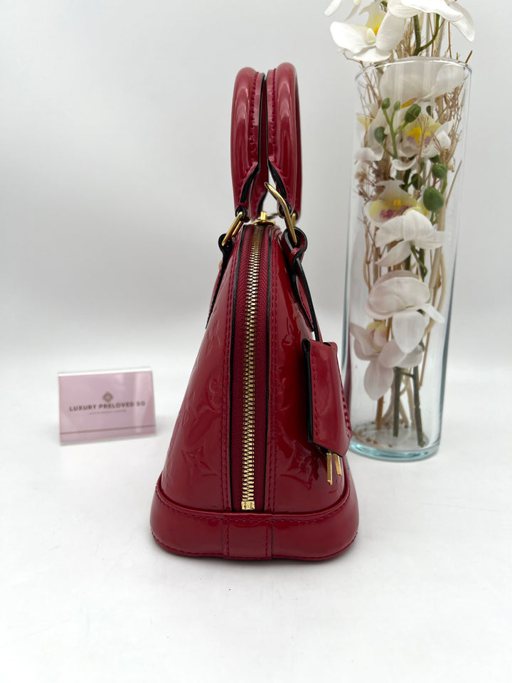 LOUIS VUITTON ALMA BB VERNIS
