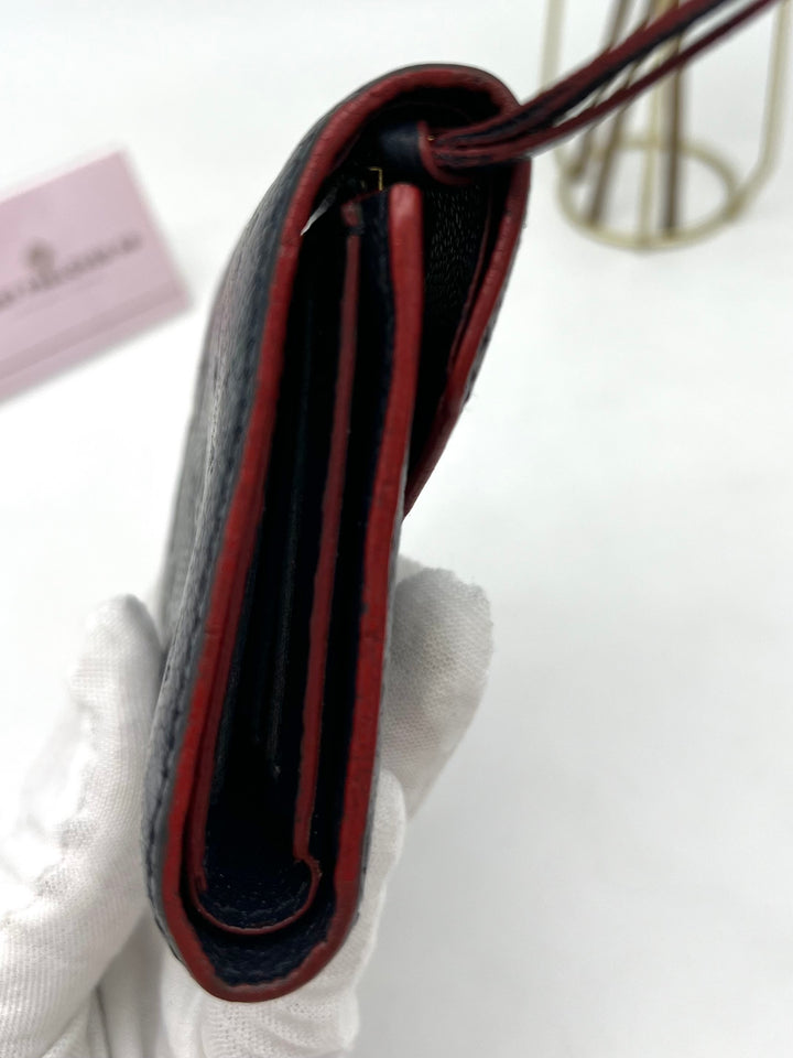LOUIS VUITTON VICTORINE WALLET EMPREINTE