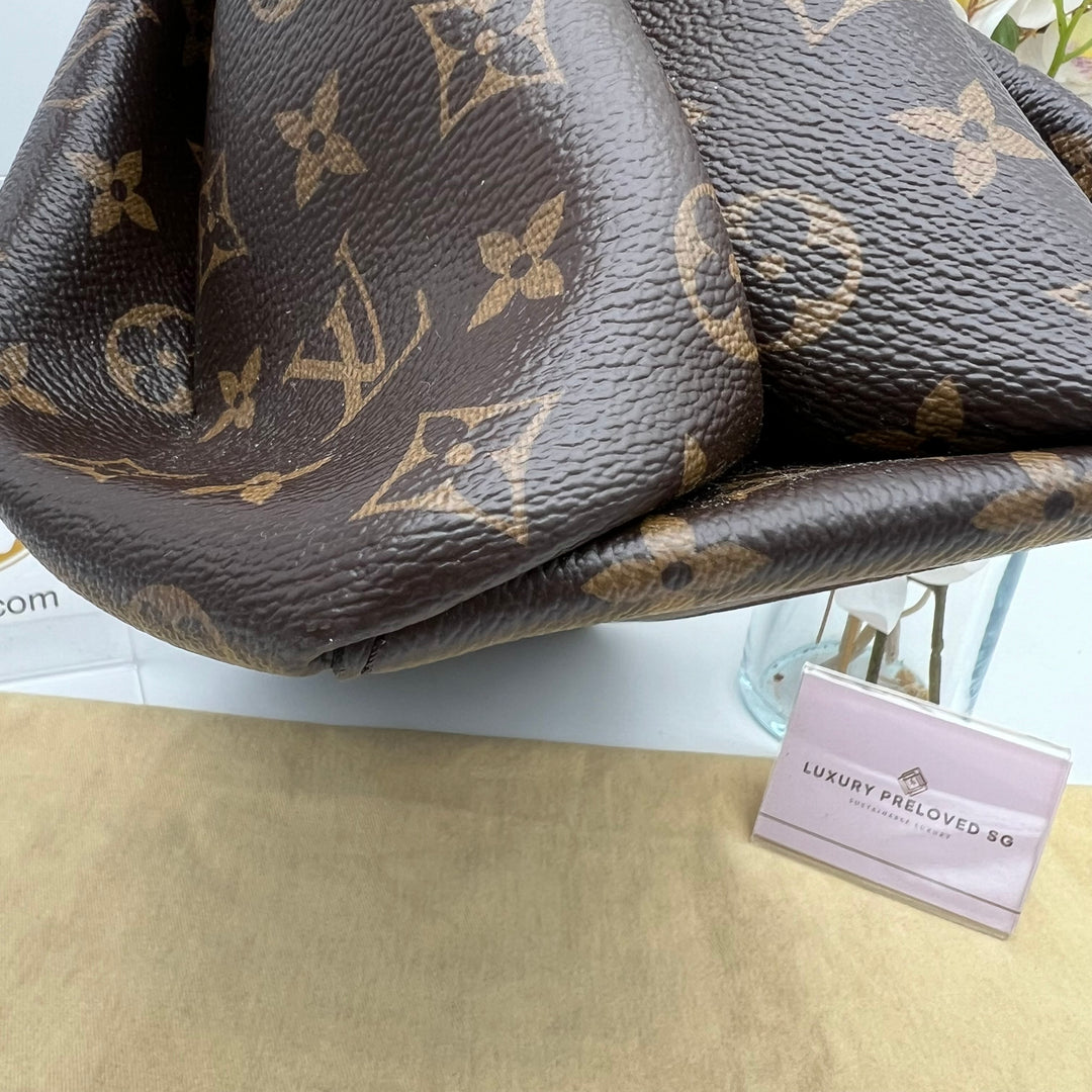 LOUIS VUITTON RIVOLI MONOGRAM PM