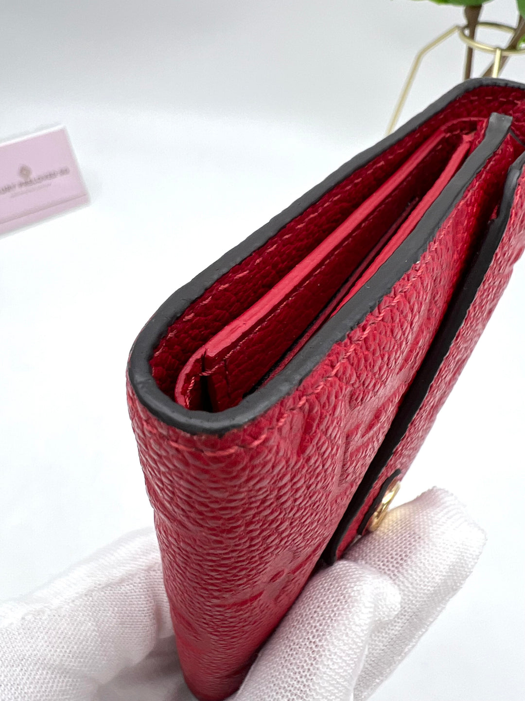 LOUIS VUITTON VICTORINE WALLET EMPREINTE