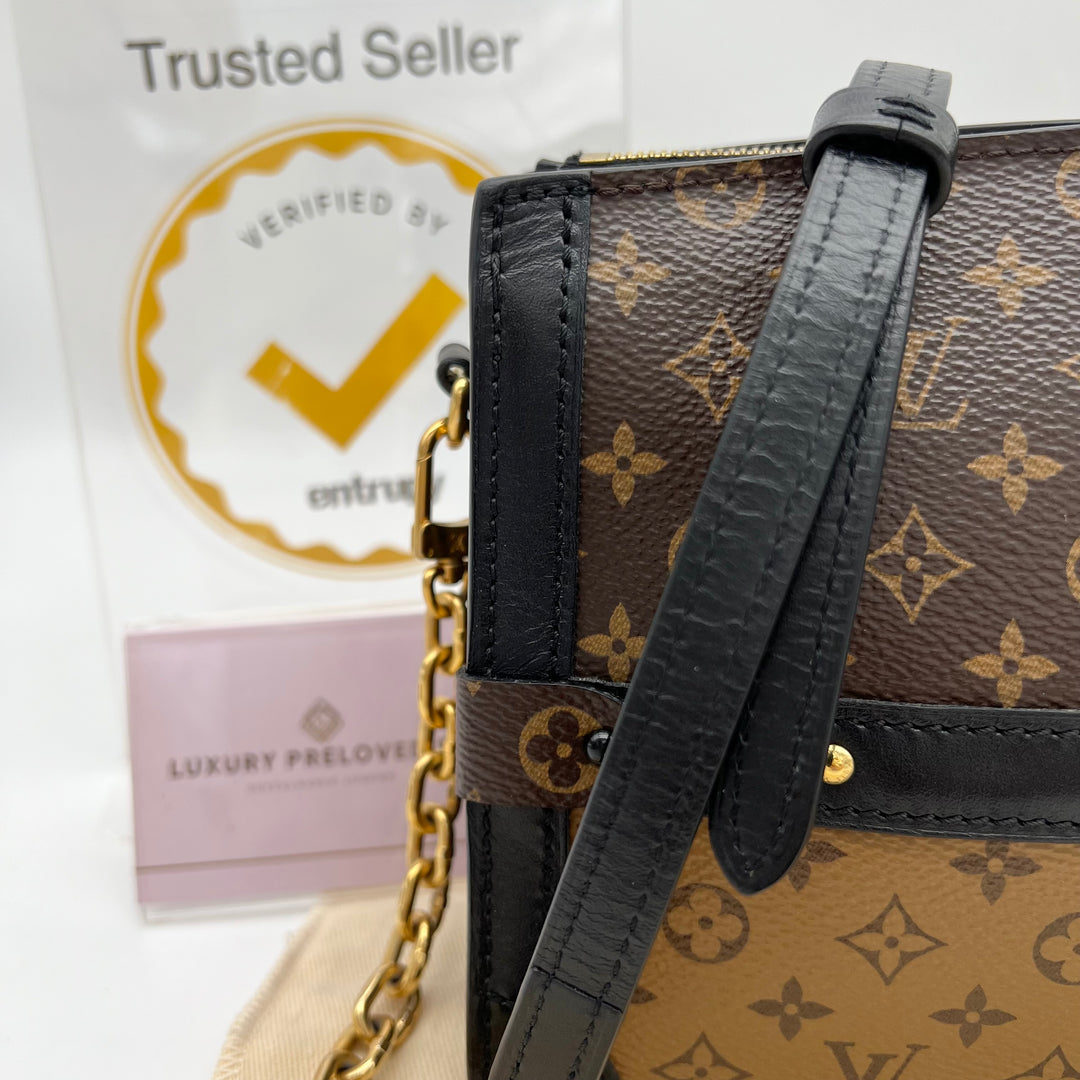 LOUIS VUITTON TRUNK CLUTCH 2 WAY BAG ( MICROCHIPPED )