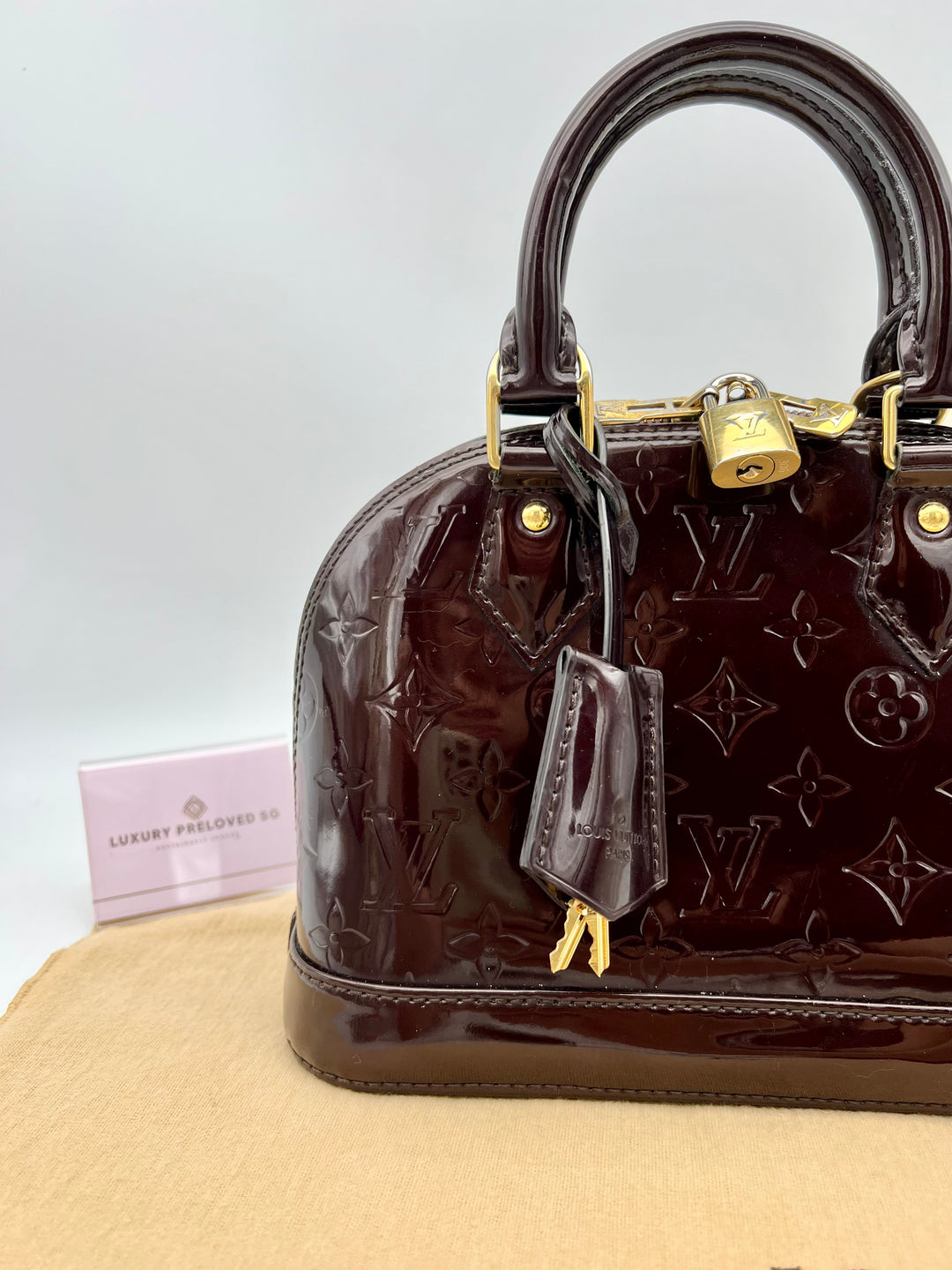 LOUIS VUITTON ALMA BB VERNIS