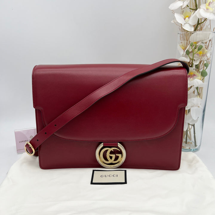 GUCCI TEXTURED CALFSKIN TORCHON GG RING CHERRY RED