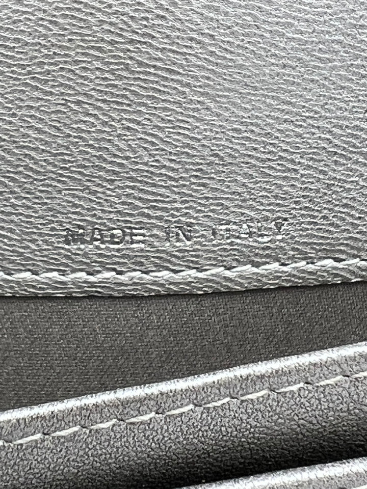 CHANEL LAMBSKIN CAMELLIA EMBOSSED ZIP AROUND ORGANISER WALLET