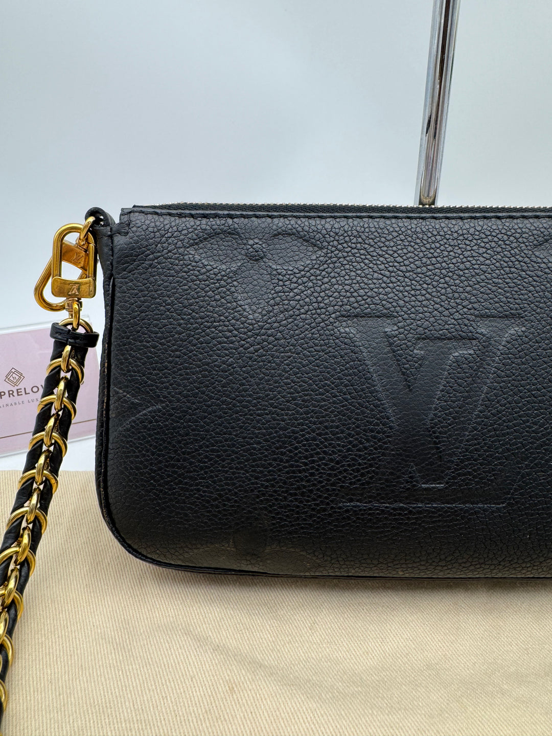 LOUIS VUITTON MULTI POCHETTE EMPRIENTE