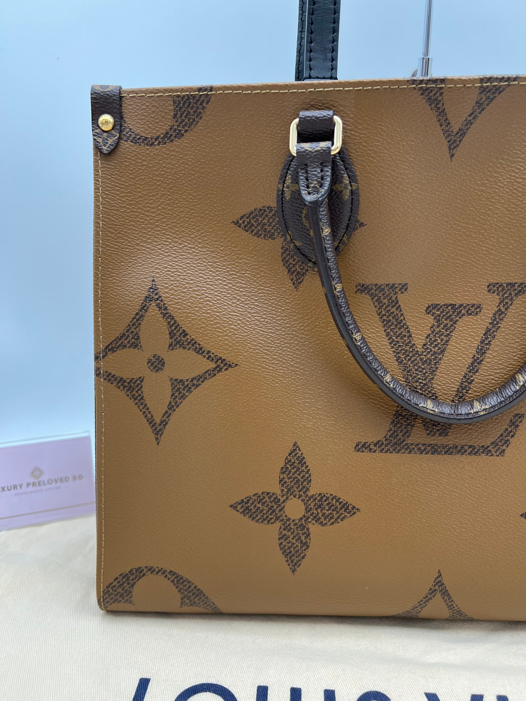 LOUIS VUITTON ON THE GO MM REVSERSED (RFID)