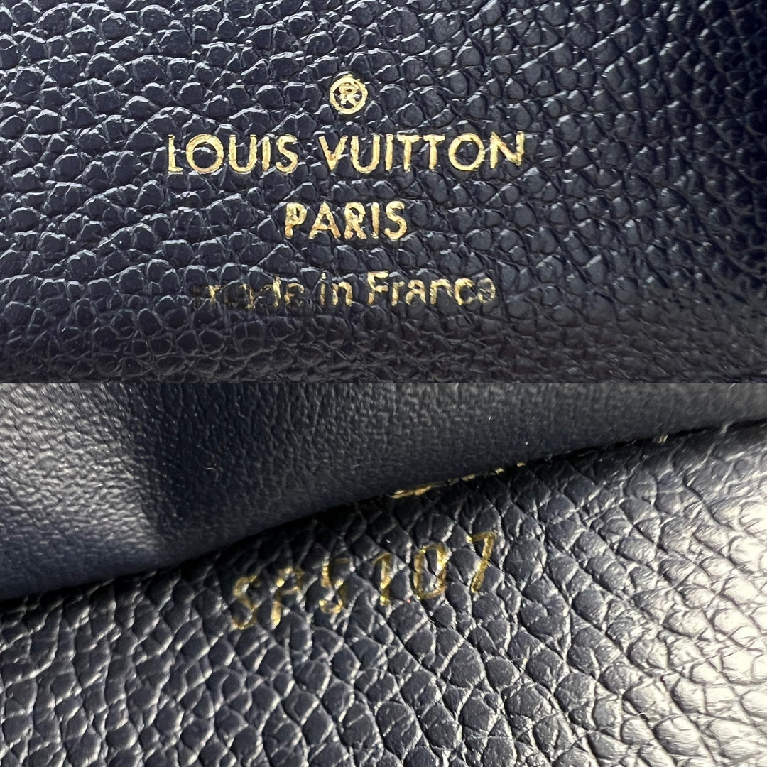 LOUIS VUITTON VICTORINE WALLET EMPREINTE