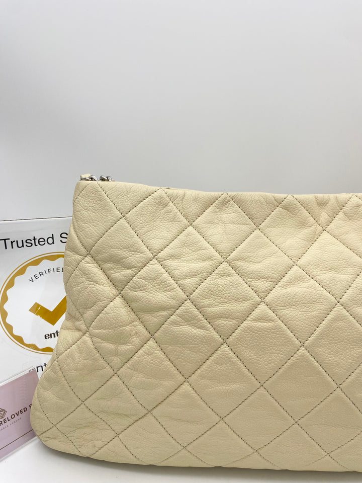 CHANEL CAVIAR QUILTED ZIP EXPANDABLE SHOULDER BAG