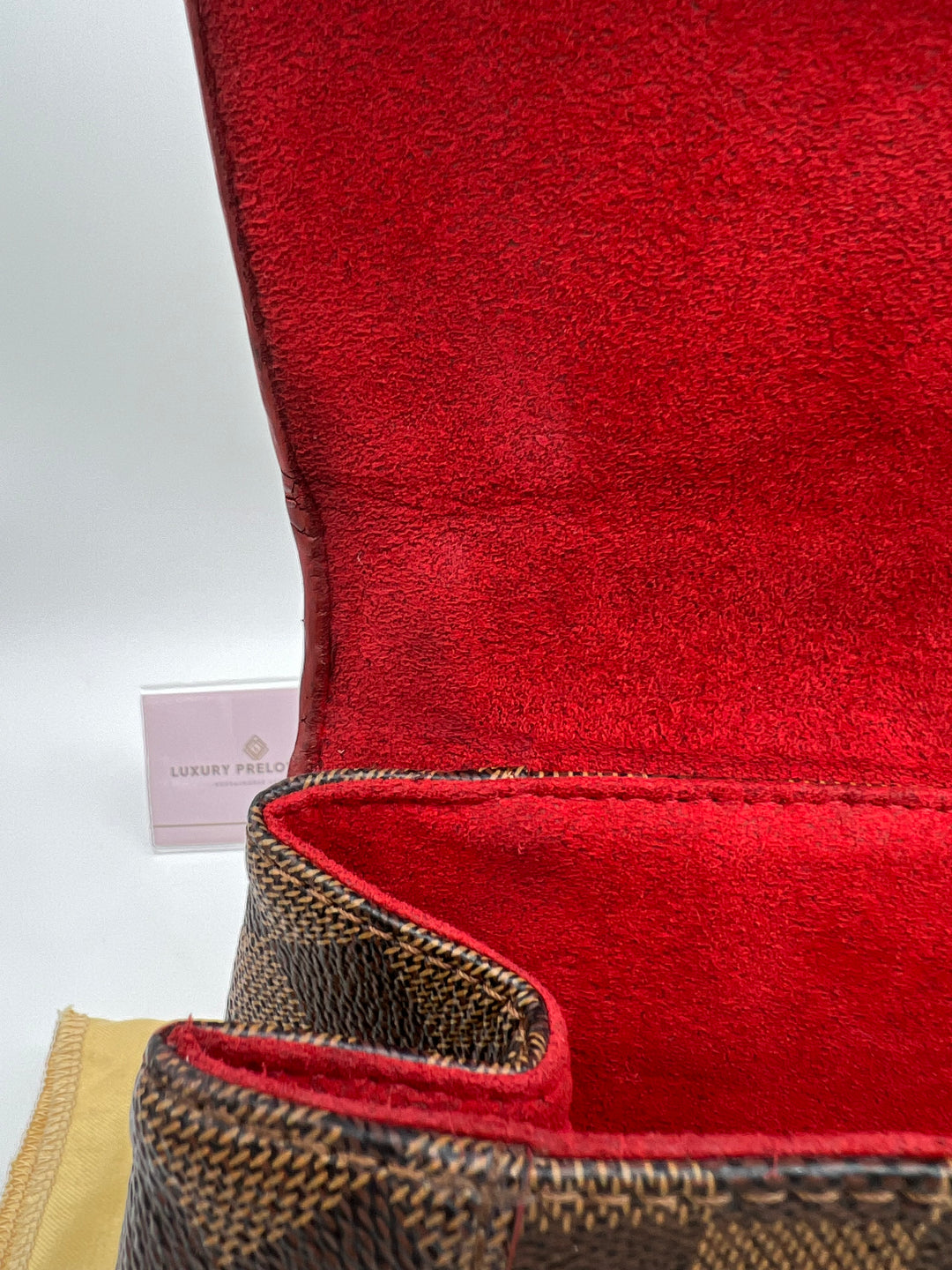 LOUIS VUITTON DAMIER EBENE CAISSA CLUTCH CHERRY