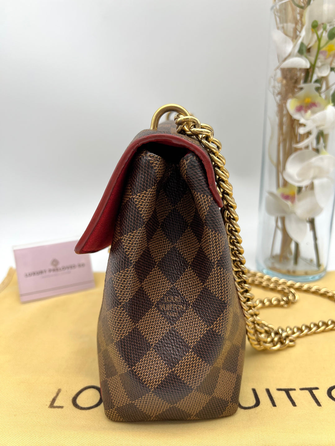 LOUIS VUITTON DAMIER EBENE CAISSA CLUTCH CHERRY