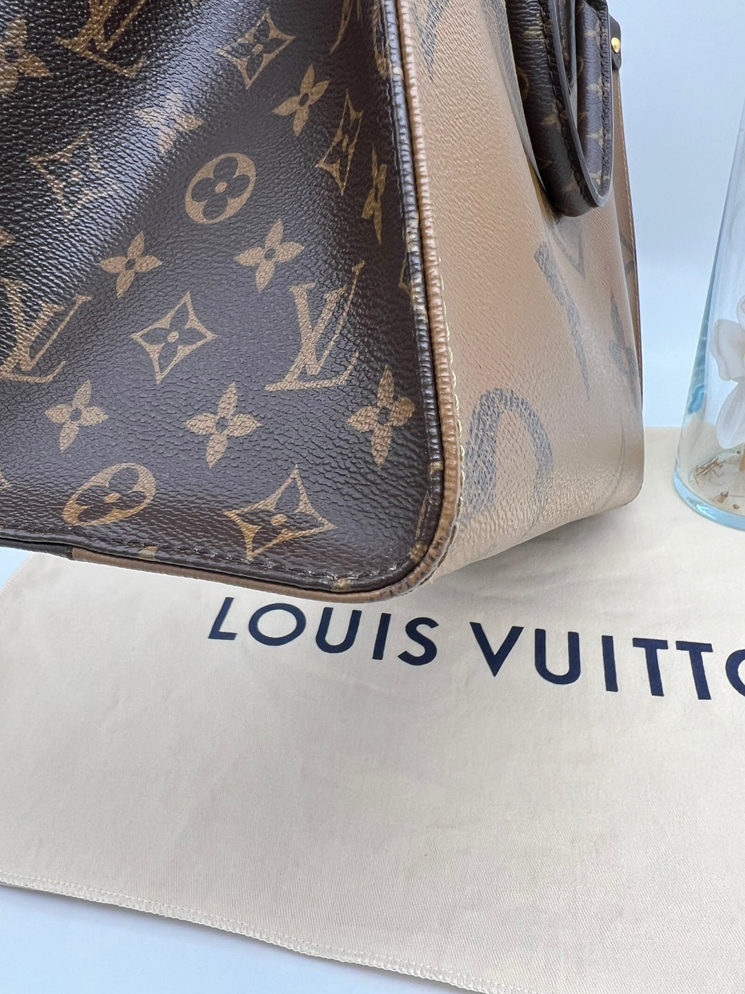 LOUIS VUITTON ON THE GO MM REVSERSED (RFID)