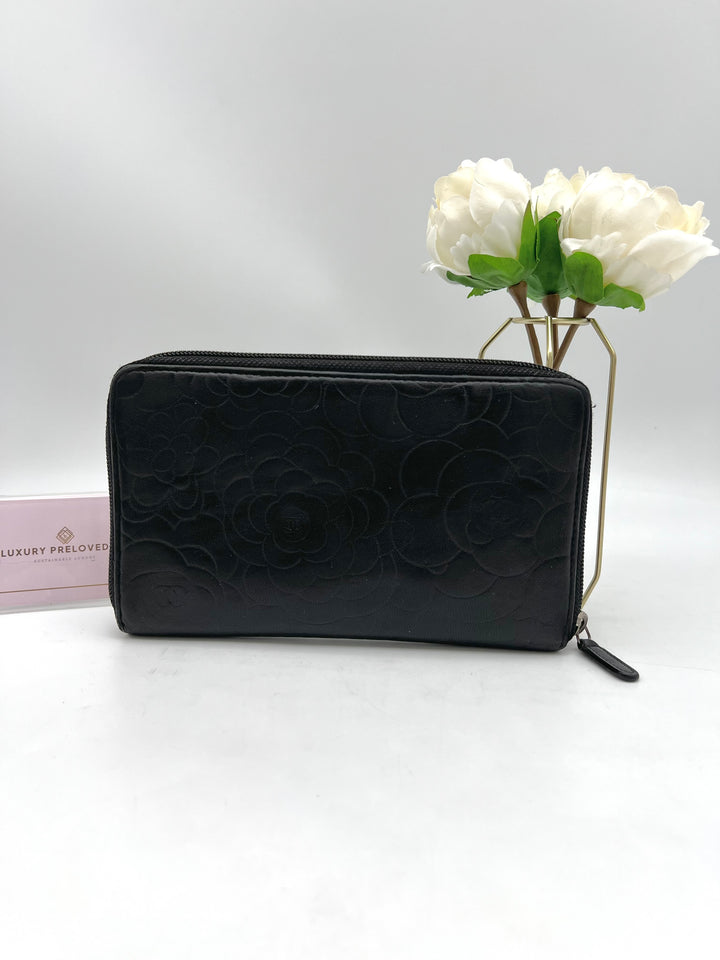 CHANEL LAMBSKIN CAMELLIA EMBOSSED ZIP AROUND ORGANISER WALLET