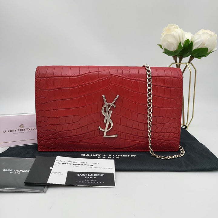 YVES SAINT LAURENT EMBOSSED CROC LEATHERCLUTCH