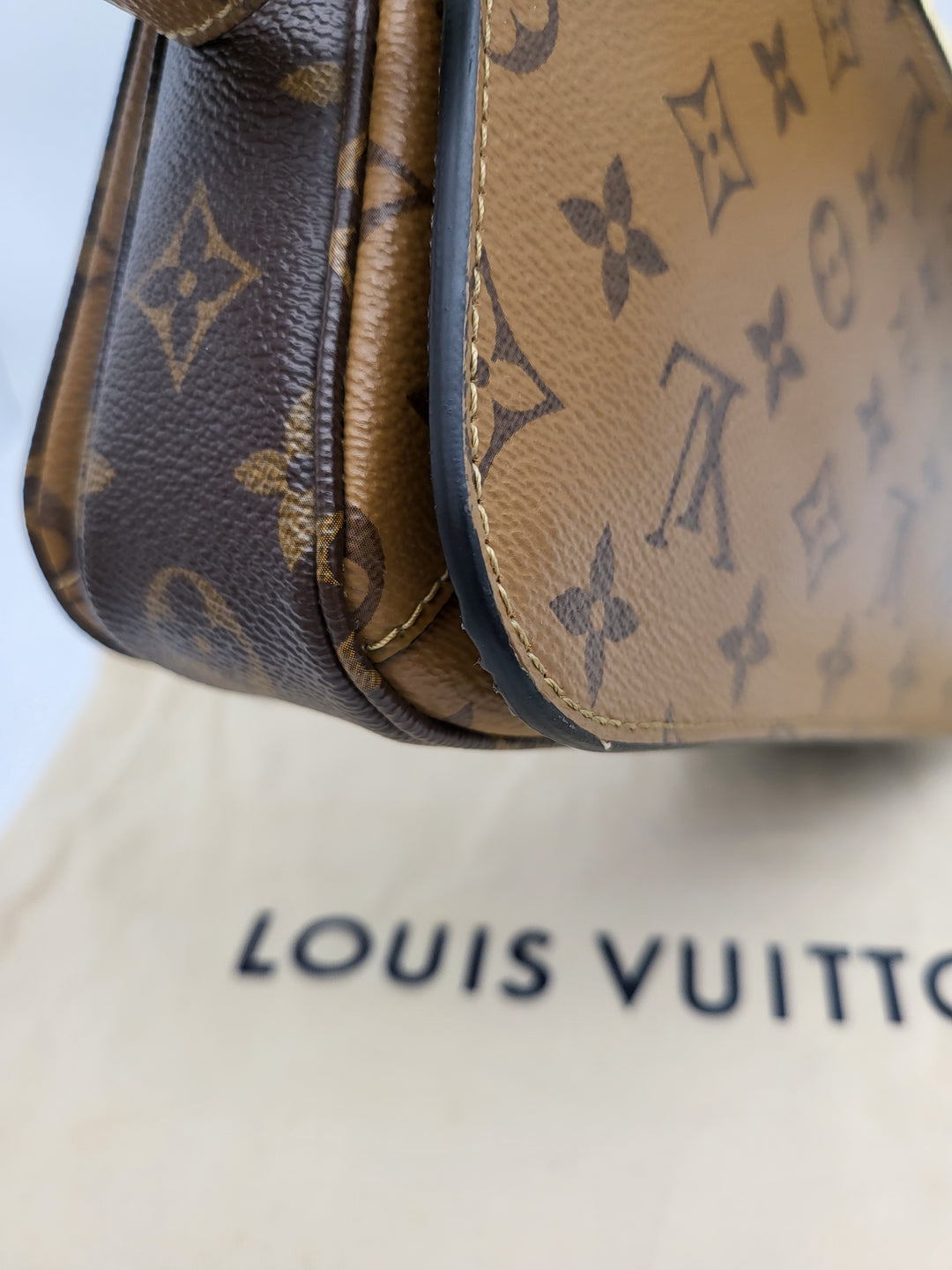 LOUIS VUITTON POCHETTE METIS MONOGRAM REVERSED