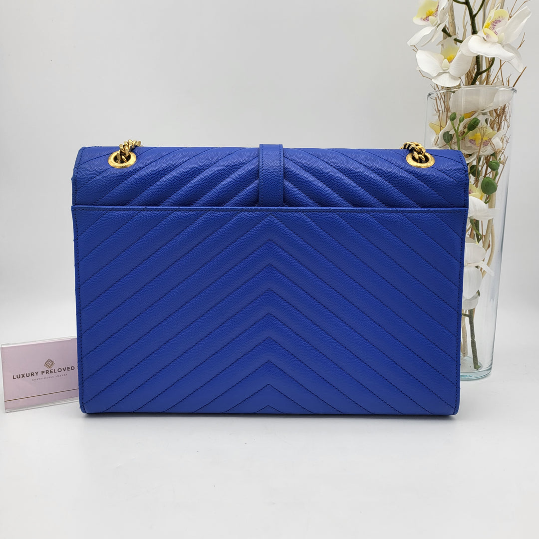 YVES SAINT LAURENT BLUE QUILTED MONOGRAM ENVELOPE