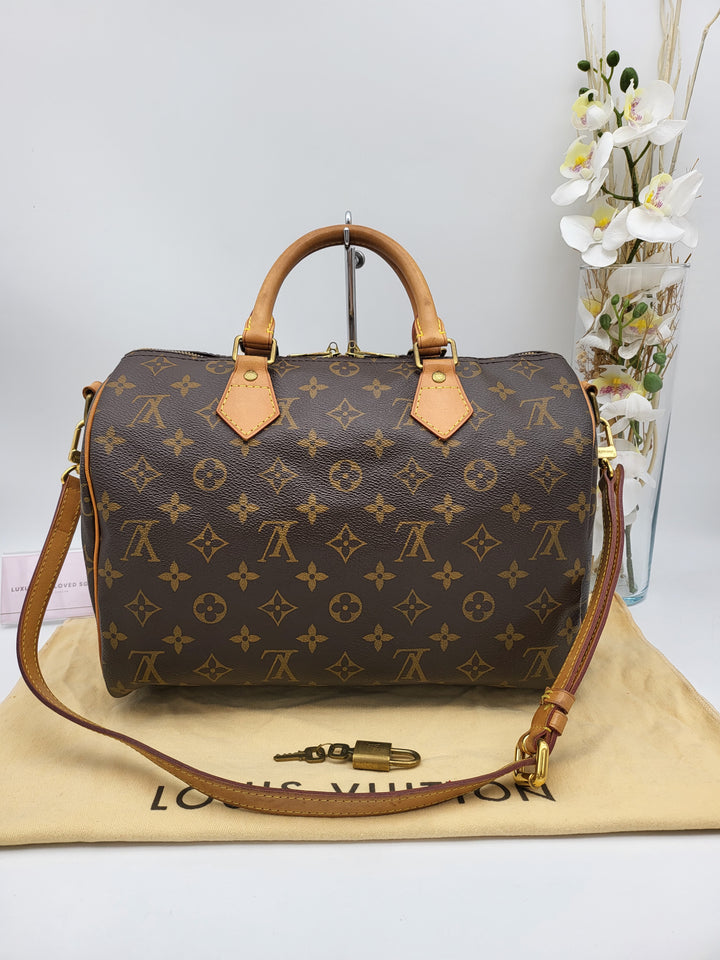 LOUIS VUITTON BANDOULIERE 30 MONOGRAM