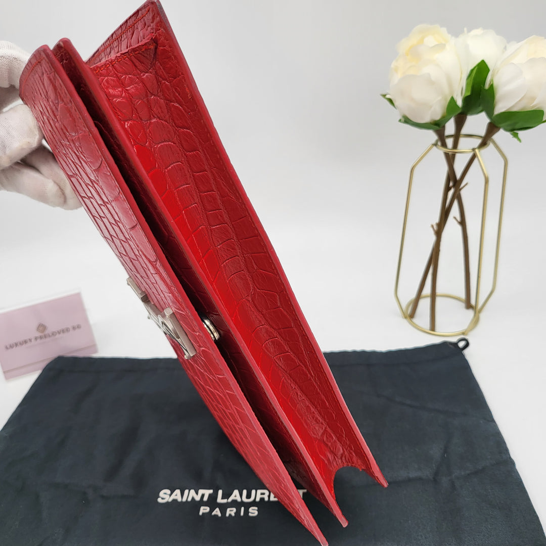 YVES SAINT LAURENT EMBOSSED CROC LEATHERCLUTCH