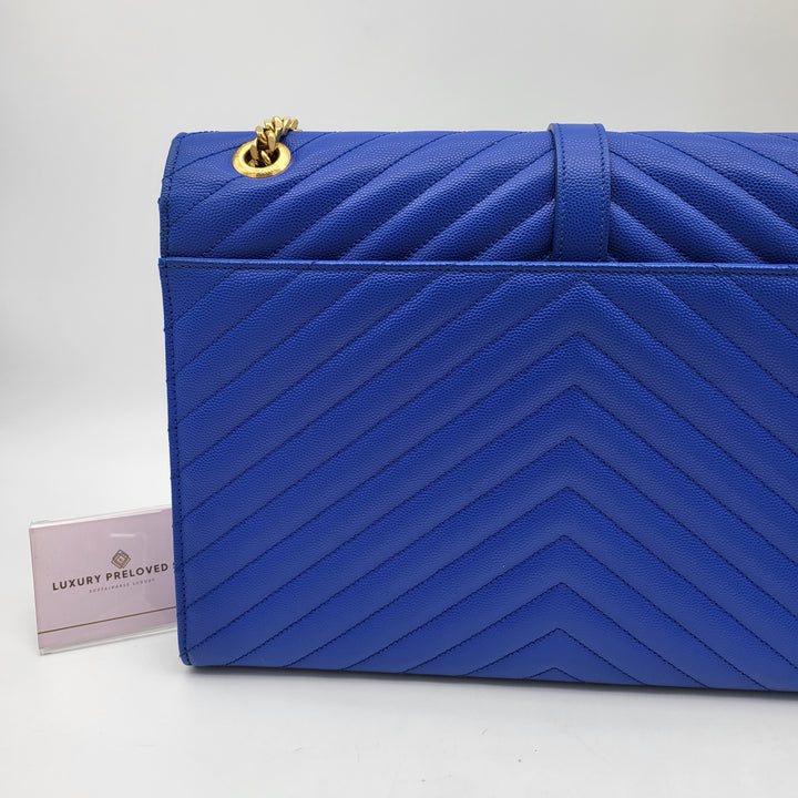 YVES SAINT LAURENT BLUE QUILTED MONOGRAM ENVELOPE