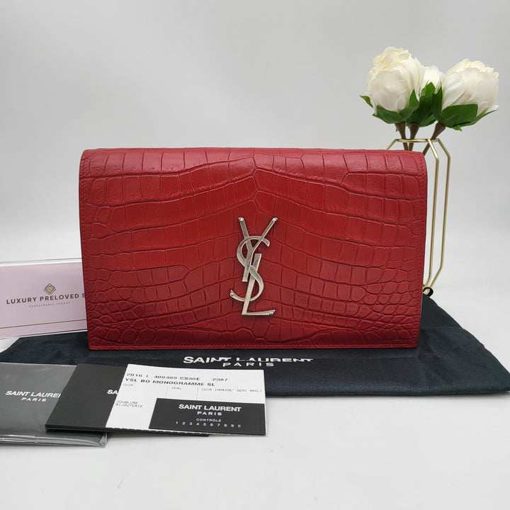 YVES SAINT LAURENT EMBOSSED CROC LEATHERCLUTCH