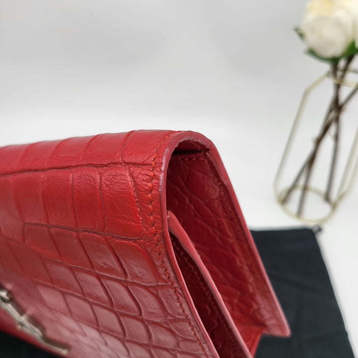 YVES SAINT LAURENT EMBOSSED CROC LEATHERCLUTCH